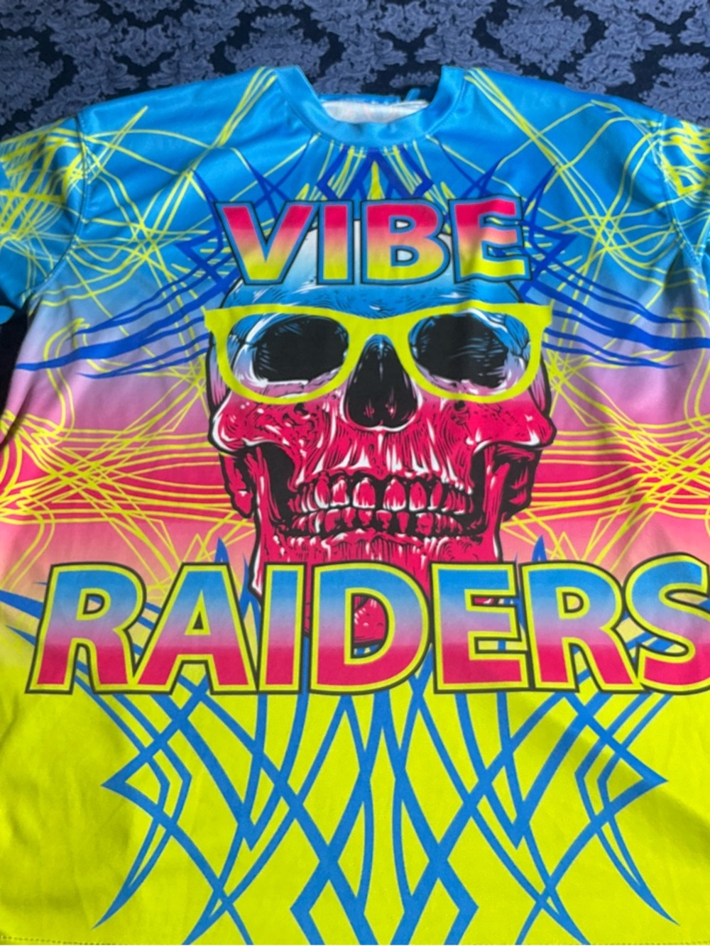 Vibe Raiders Neon Skull Graphic Tee